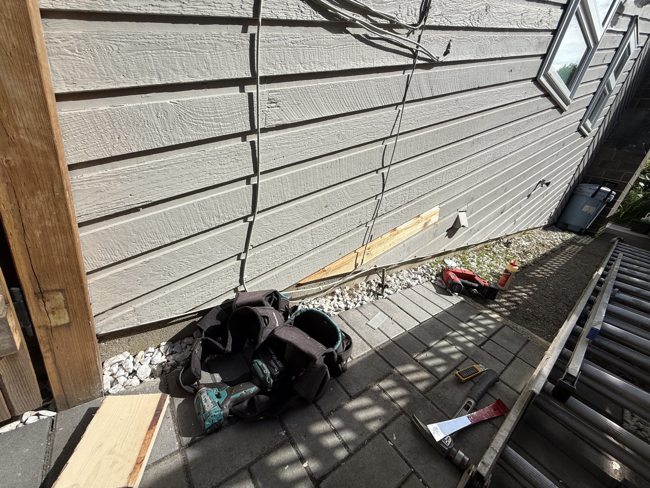 Tools and materials prepared for exterior wood repair
